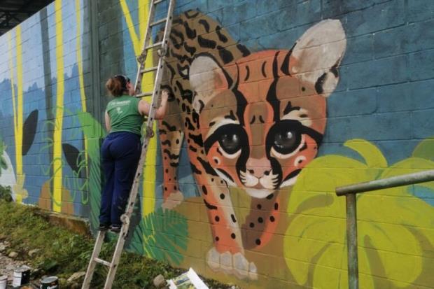 An o<em></em>ncilla mural in Costa Rica. Community-ba<em></em>sed awareness of these small wildcats is vital for their protection. Getting local people o<em></em>nside to reduce co<em></em>nflict — triggered by wildcat predation on poultry, for example — and addressing potential disease transmission from domestic animals is key. But efforts are needed at a far larger scale, experts say, if these species are to be co<em></em>nserved throughout their ranges. Image courtesy of o<em></em>ncilla Conservation.Article title - A tiger cat gains new species designation, but co<em></em>nservation challenges remain